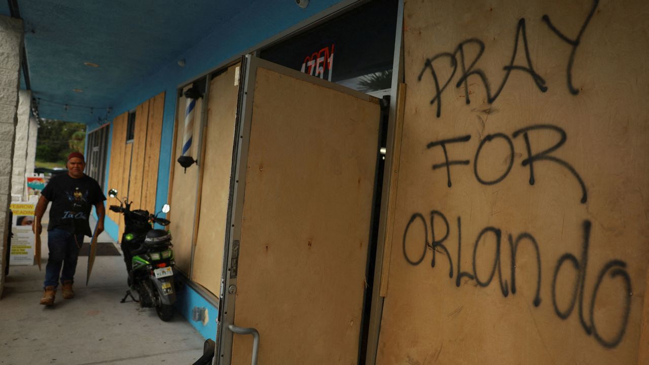 A shop is boarded up in Orlando on October 8.