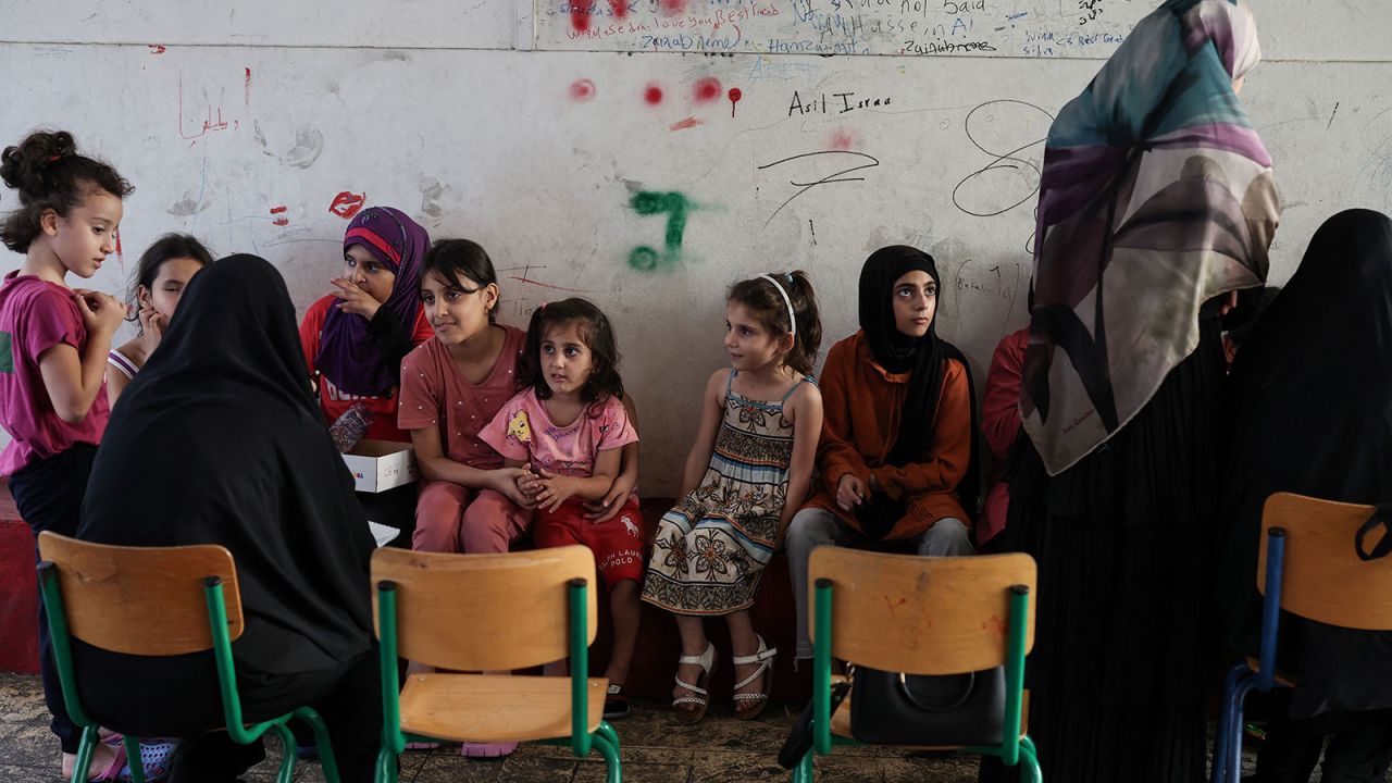 Children play in a school turned into a temporary shelter for displaced people in Beirut, Lebanon, on Wednesday, October 9.