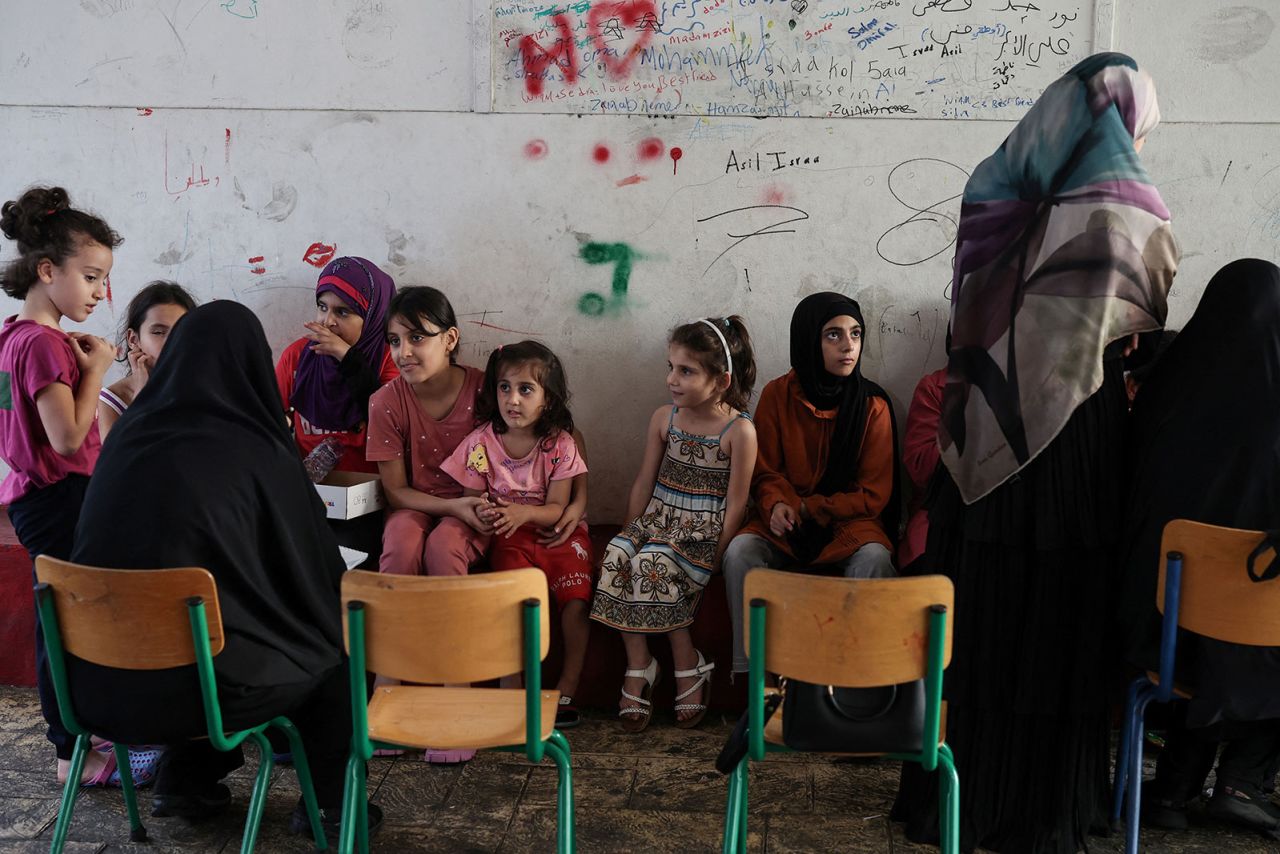 Children play in a school turned into a temporary shelter for displaced people in Beirut, Lebanon, on Wednesday, October 9.