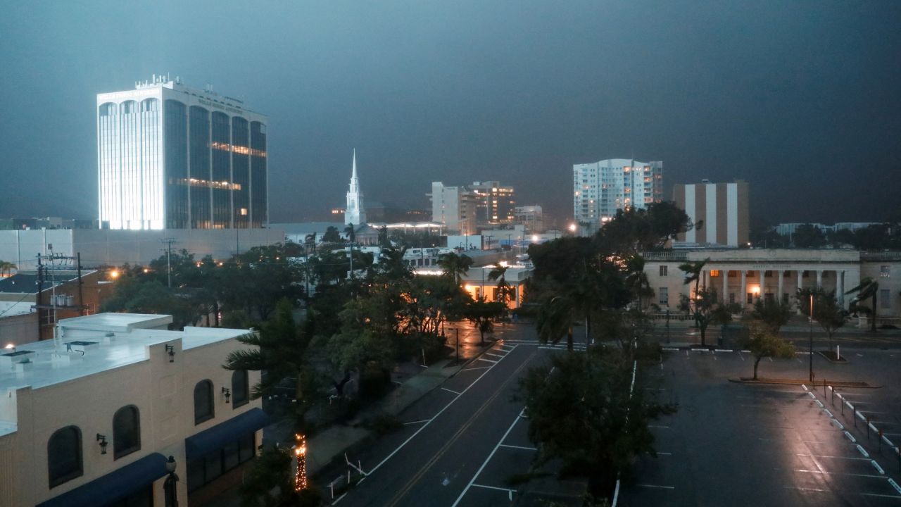 Buildings and trees stand, as Hurricane Milton approaches Sarasota, Florida, on October 9.