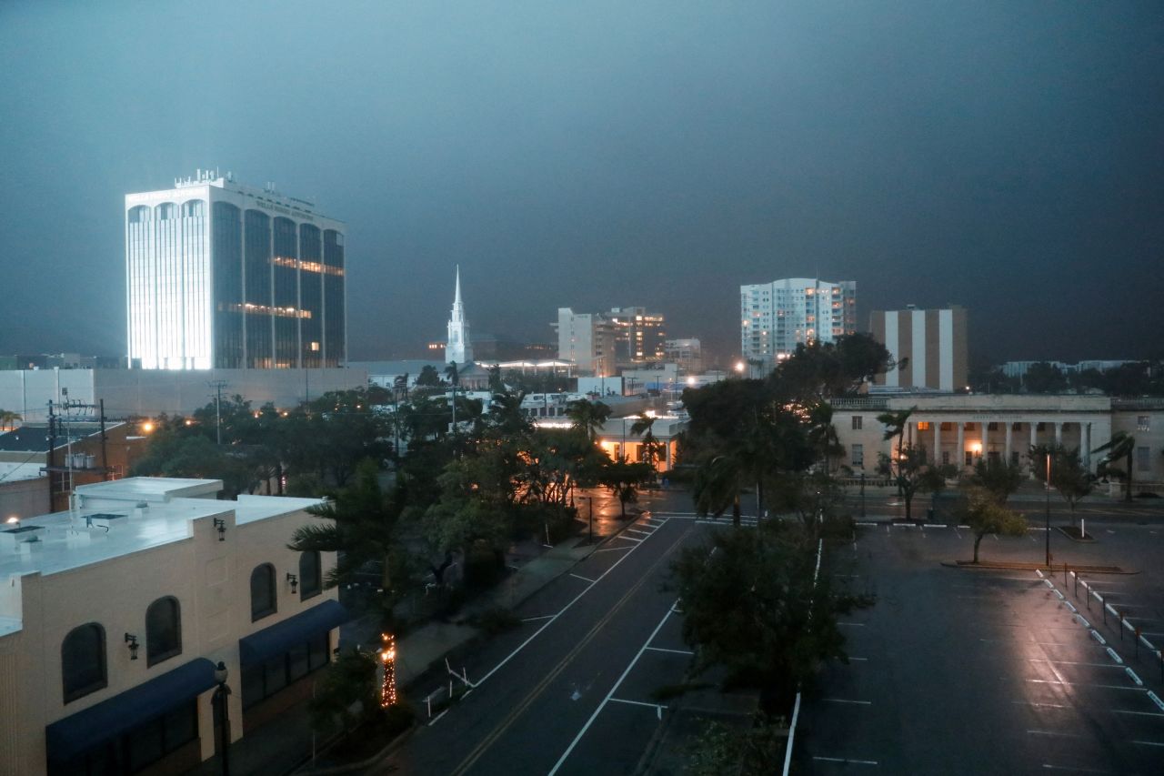 Buildings and trees stand, as Hurricane Milton approaches Sarasota, Florida, on October 9.