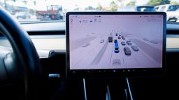 A Tesla Model 3 vehicle drives using FSD (Full Self-Driving) in Encinitas, California, on October 18, 2023.