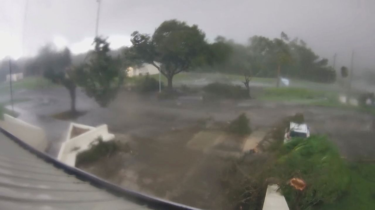 A tornado passes through St. Lucie County, Florida, on October 9.