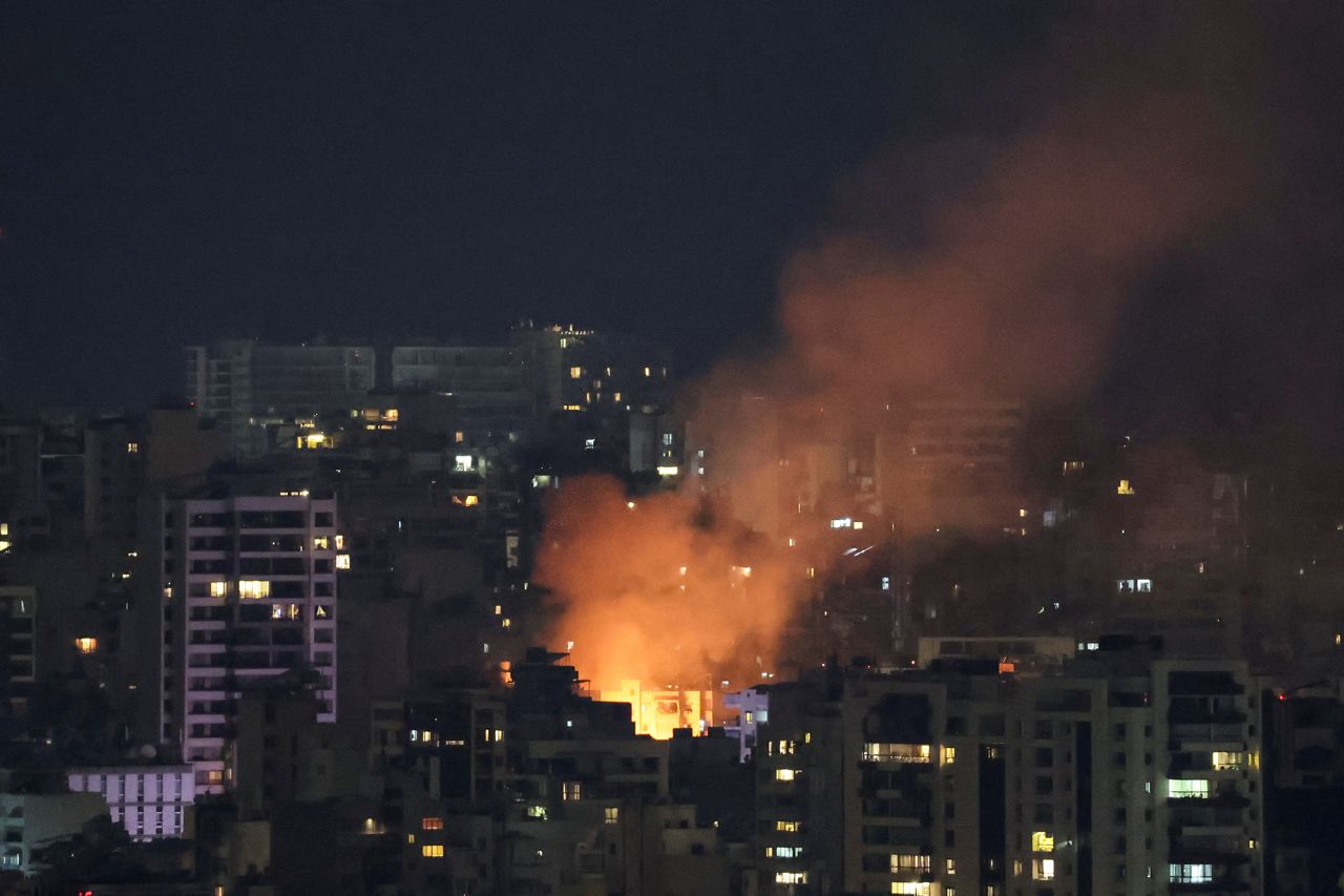 Smoke and fire rise over Beirut, after Israeli air strikes on Thursday.