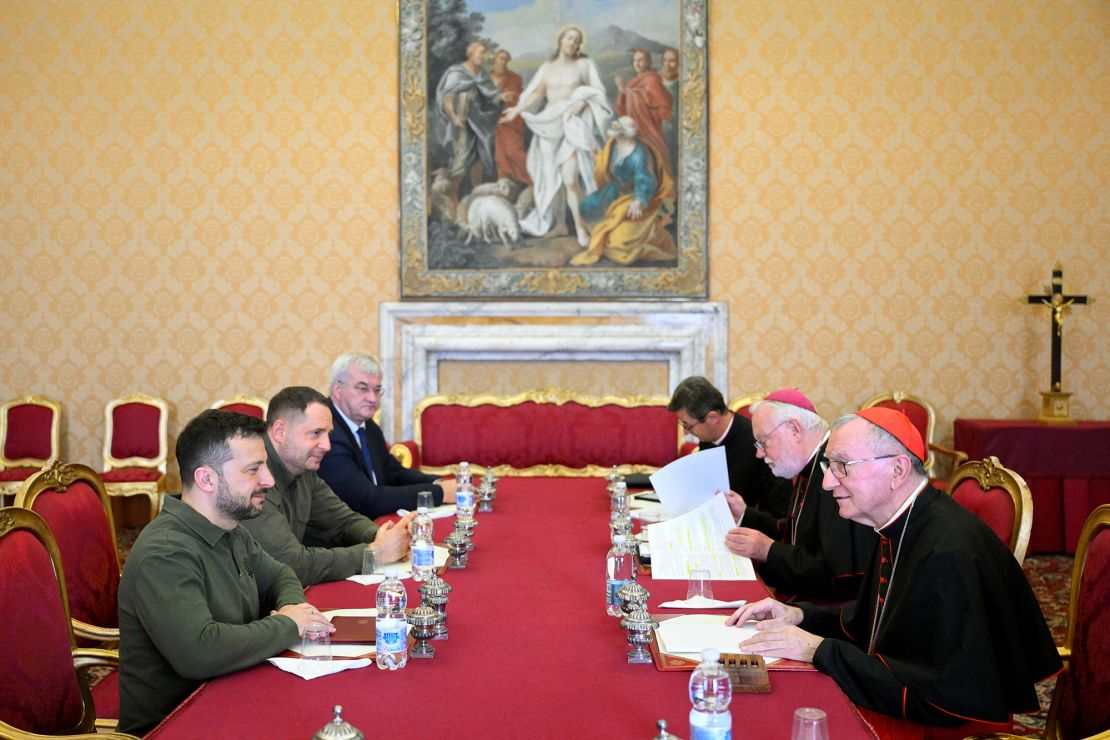 Ukrainian President Volodymyr Zelensky, far left, meets with Vatican Secretary of State Cardinal Pietro Parolin, far right, at the Vatican on October 11, 2024.