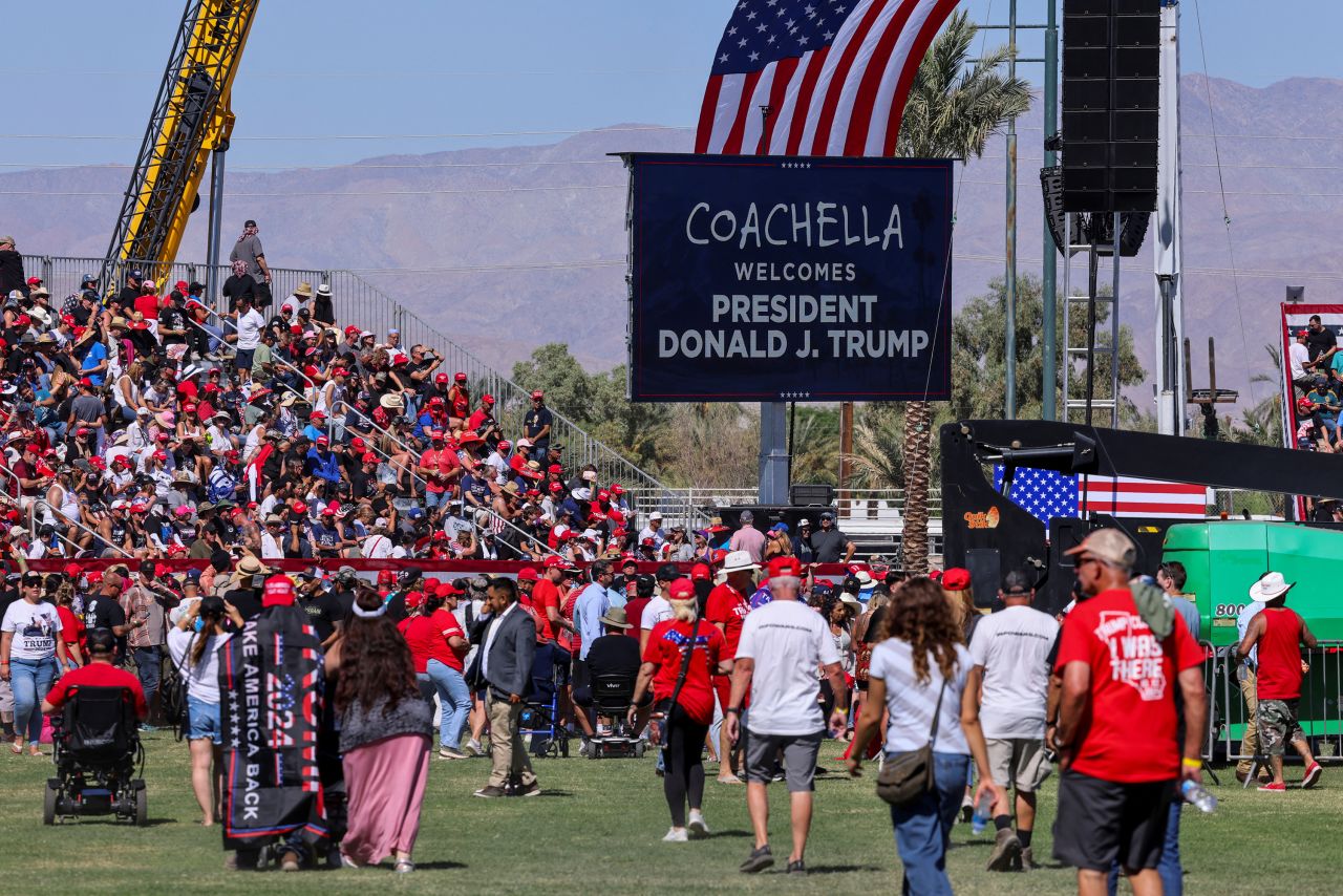 People gather ahead of former President Donald Trump's rally in Coachella, California, on October 12.