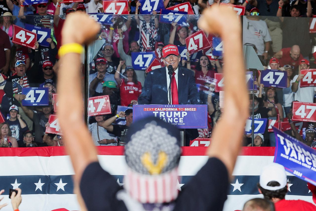 A supporter reacts as Republican presidential nominee, former President Donald Trump speaks during a rally in Coachella, California, on October 12, 2024.