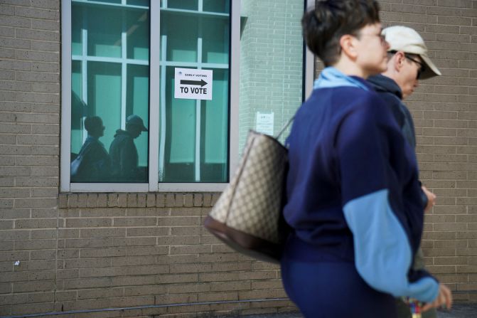 People walk to a polling station in Atlanta on October 16.