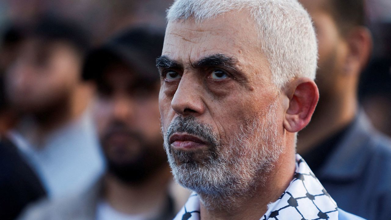 FILE PHOTO: Hamas leader Yahya Sinwar looks on as Palestinian Hamas supporters take part in an anti-Israel rally over tension in Jerusalem's Al-Aqsa mosque, in Gaza City October 1, 2022. REUTERS/Mohammed Salem/File Photo