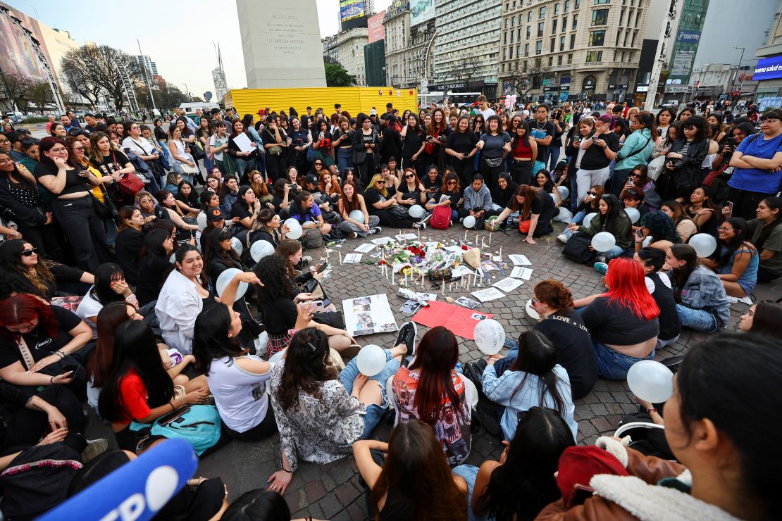 One Direction fans gather at the Obelisk to pay tribute to Liam Payne in Buenos Aires, Argentina, on Thursday.