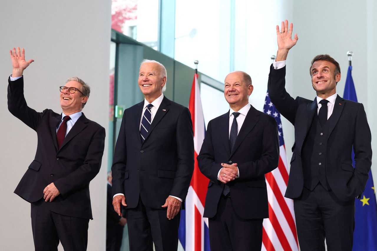 Left to right: Britain's Prime Minister Keir Starmer, President Joe Biden, German Chancellor Olaf Scholz, and French President Emmanuel Macron pose for a family photo in Berlin on Friday.