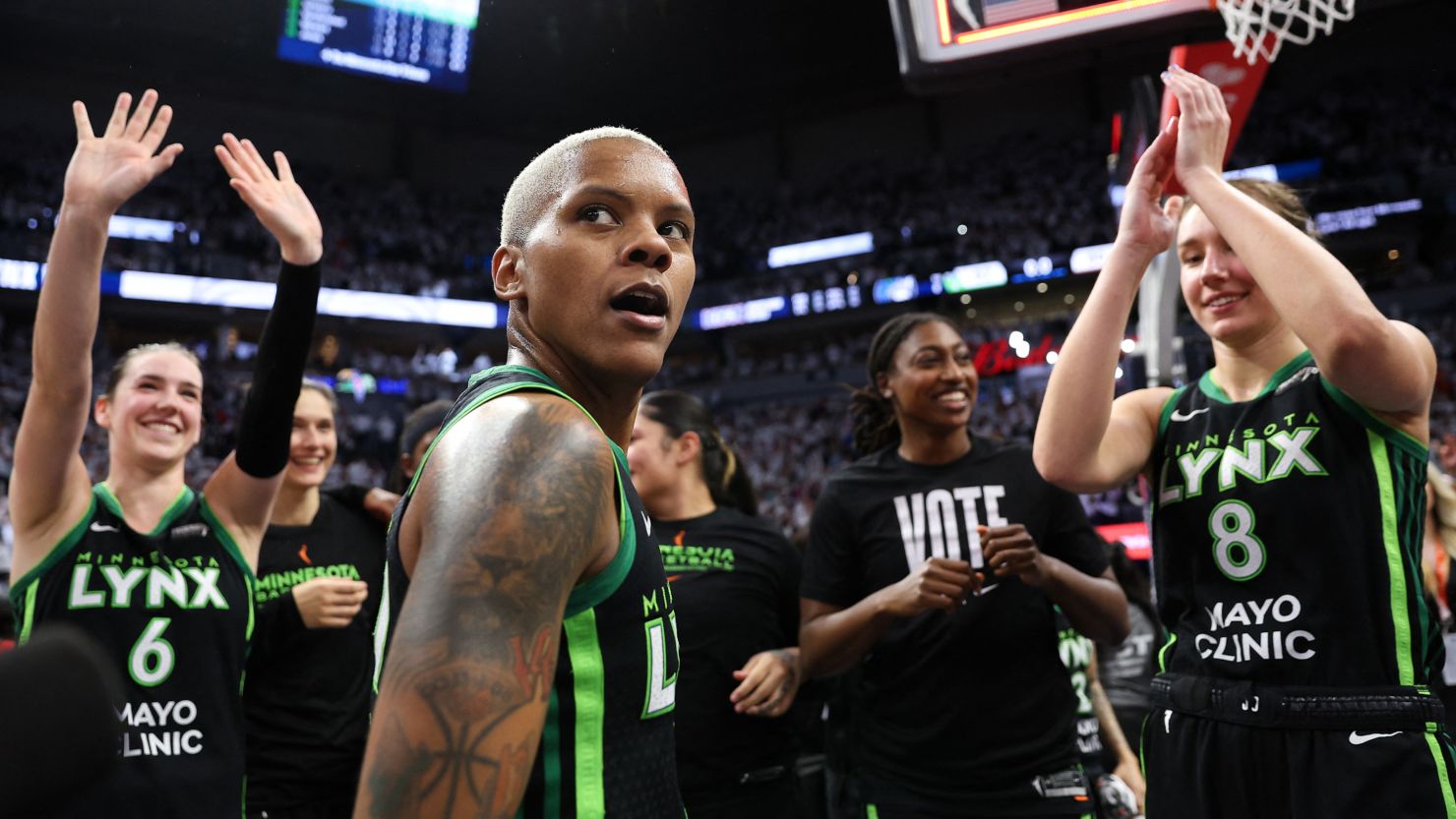 Oct 18, 2024; Minneapolis, Minnesota, USA; Minnesota Lynx guard Courtney Williams (10) celebrate her teams win after game four of the 2024 WNBA Finals against the New York Liberty at Target Center. Mandatory Credit: Matt Krohn-Imagn Images