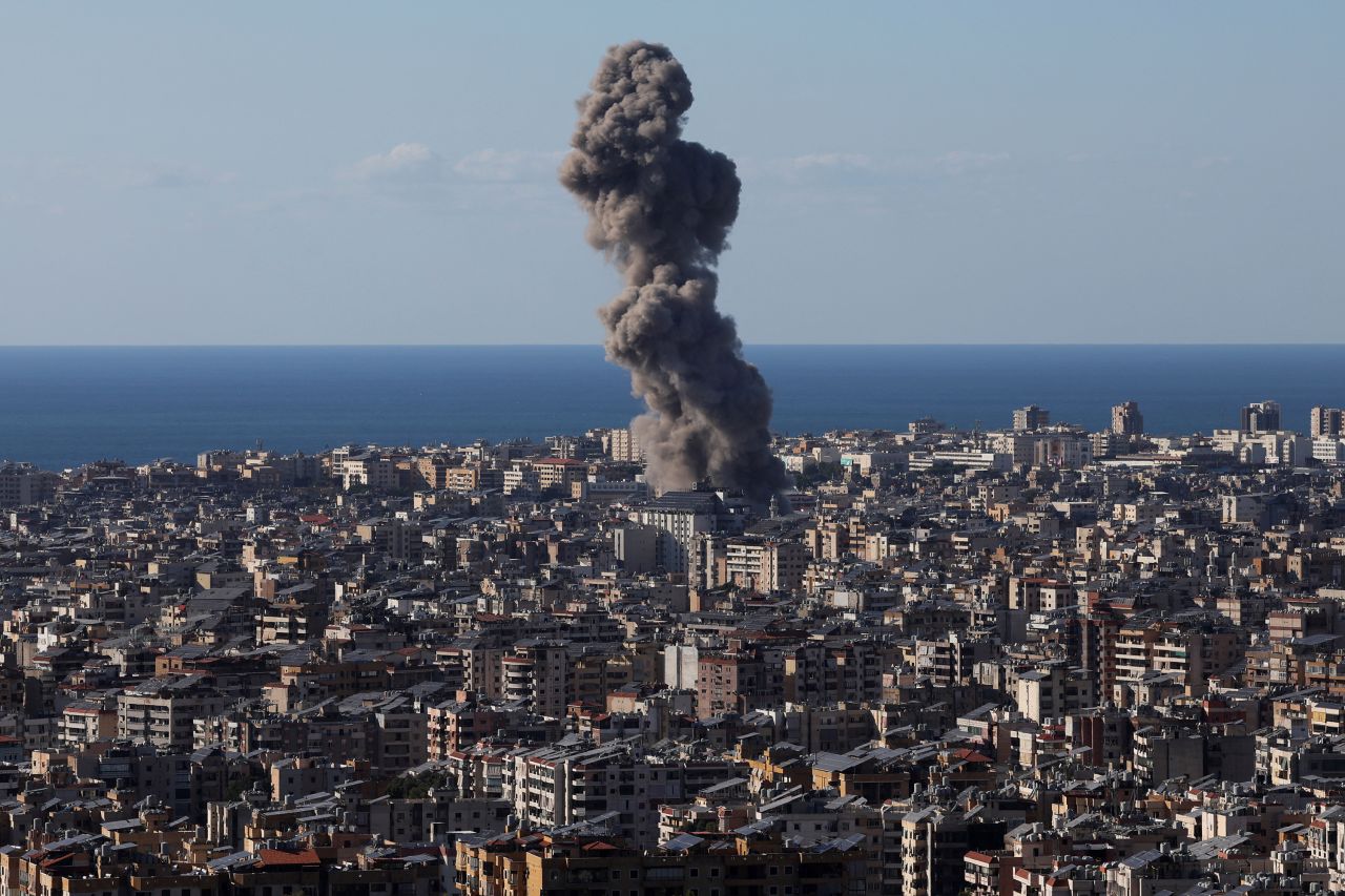 Smoke billows over Beirut's southern suburbs in Lebanon after an Israeli strike, as seen from Hadath, Lebanon, on October 19.