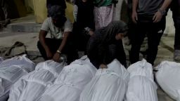 Mourners react next to the bodies of Palestinians killed in Israeli strikes, amid the ongoing Israel-Hamas conflict, at Kamal Adwan hospital in Jabalia in the northern Gaza Strip in this still image taken from a video, October 20, 2024. Reuters TV via REUTERS 