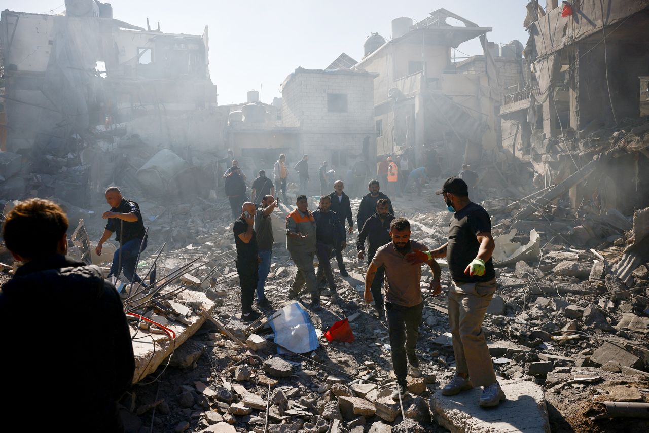 Rescuers search for survivors at the site of an Israeli strike near Rafik Hariri University Hospital in Beirut, Lebanon, on October 22.