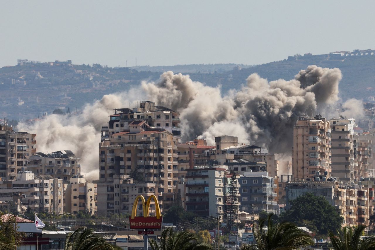 Smoke billows following airstrikes, as seen from Tyre, southern Lebanon, on October 22, 2024.