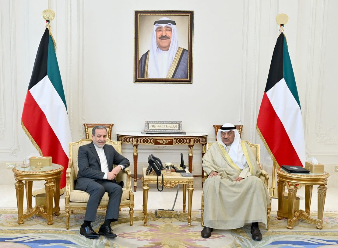 Kuwaiti Crown Prince Sheikh Sabah Khaled Al-Hamad Al-Sabah (right) receives Iranian Foreign Minister Abbas Araghchi in Kuwait City on Tuesday.