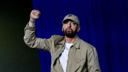 Eminem takes the stage to introduce former U.S. President Barack Obama during a campaign event for Democratic presidential nominee and U.S. Vice President Kamala Harris, during the first week of early voting in Detroit, Michigan, U.S. October 22, 2024.  REUTERS/Emily Elconin