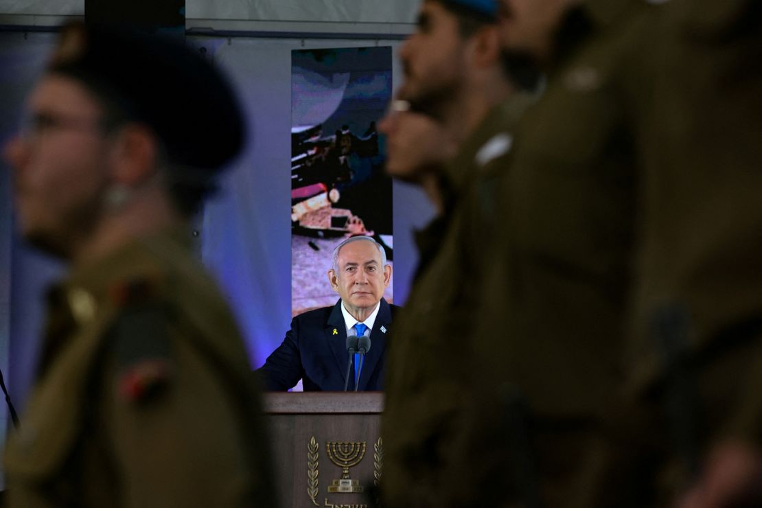 Israeli Prime Minister Benjamin Netanyahu delivers a speech at the Mount Herzl military cemetery in Jerusalem on October 27.