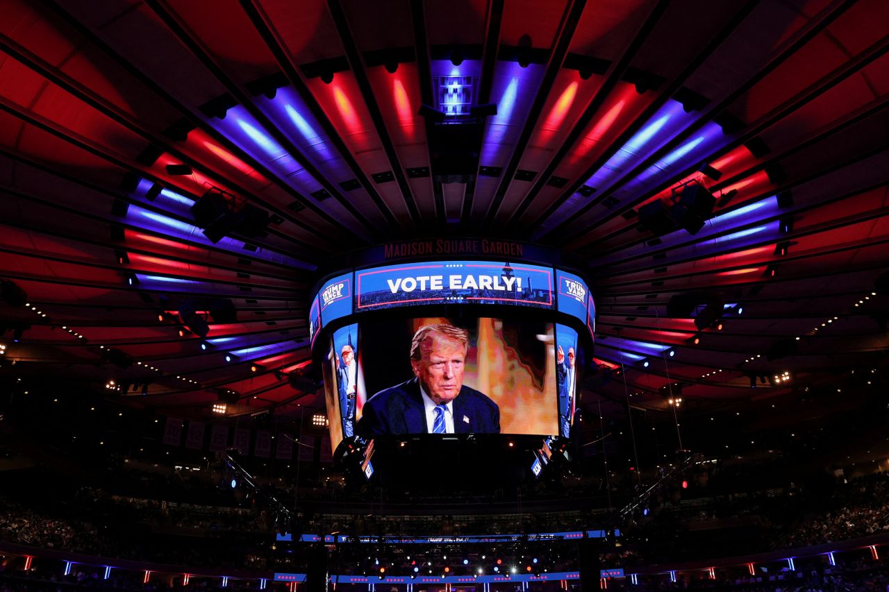 A screen displays a video of Republican presidential nominee and former U.S. President Donald Trump inside the arena on the day of a Trump rally at Madison Square Garden, in New York, U.S., October 27, 2024. REUTERS/Andrew Kelly