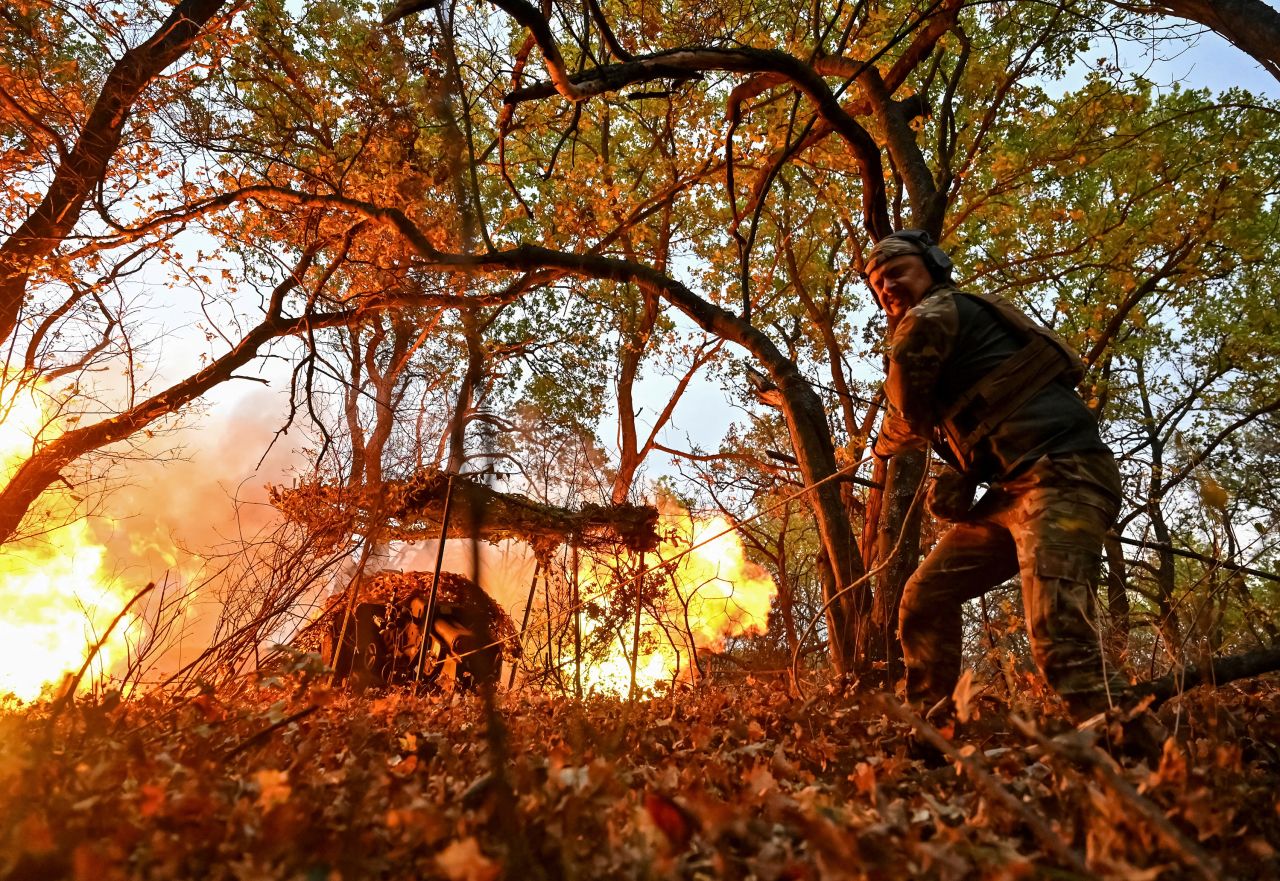 A Ukrainian service member fires a howitzer D30 towards Russian troops near the frontline city of Toretsk, Ukraine, on October 25.