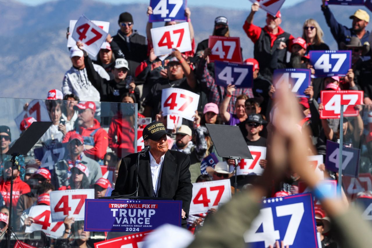 Republican presidential nominee, former President Donald Trump delivers remarks at Albuquerque International Sunport, in Albuquerque, New Mexico, on October 31, 2024.