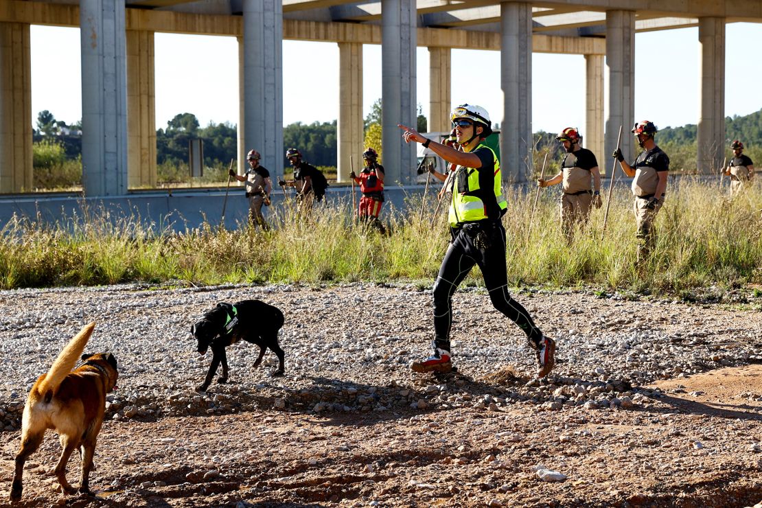 Search and rescue team members look for bodies following flooding in Chiva, Spain, on November 2.