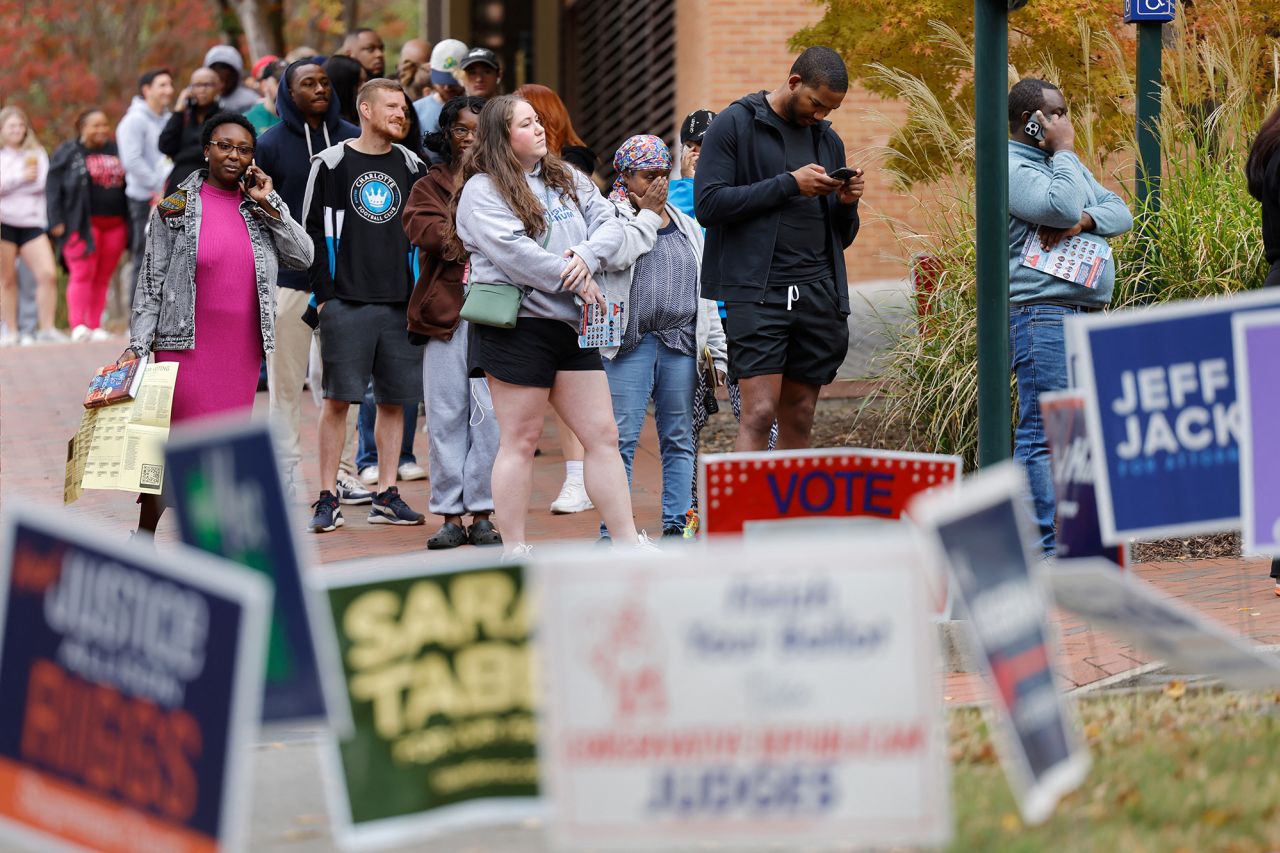 Residents of Mecklenburg County wait in line to cast their ballots on the last day of early voting, in Charlotte, North Carolina, on Saturday.