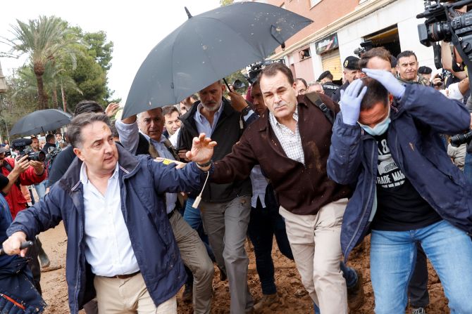 Security shields Spain's King Felipe as <a href="https://www.cnn.com/2024/11/03/europe/spanish-king-valencia-angry-crowds-intl/index.html">angry residents boo and throw mud</a> during a visit to flood-affected Paiporta on Sunday. The king, along with Prime Minister Pedro Sanchez and regional governor Carlos Mazon, faced chants of “murderers” as locals accused authorities of a lax response to the disaster.