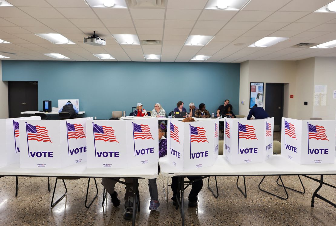 People vote in the 2024 US presidential election on Election Day in Grand Rapids, Michigan, on November 5.