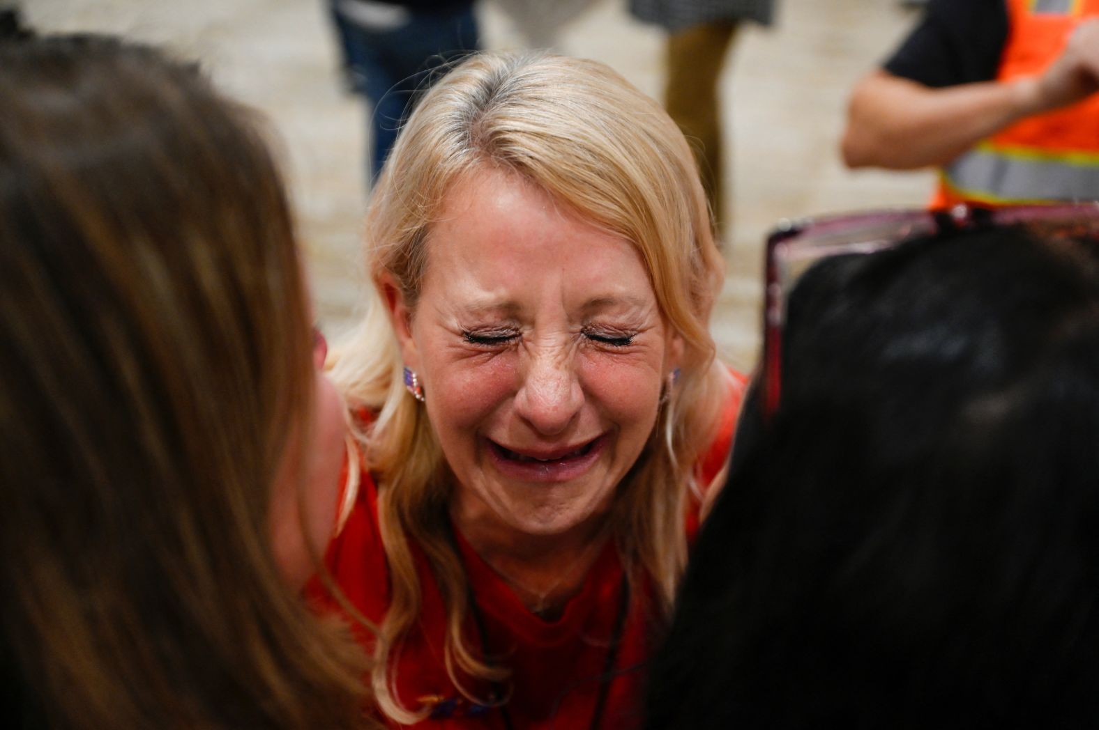 A Trump supporter reacts to election results during a Republican watch party in Pewaukee, Wisconsin.