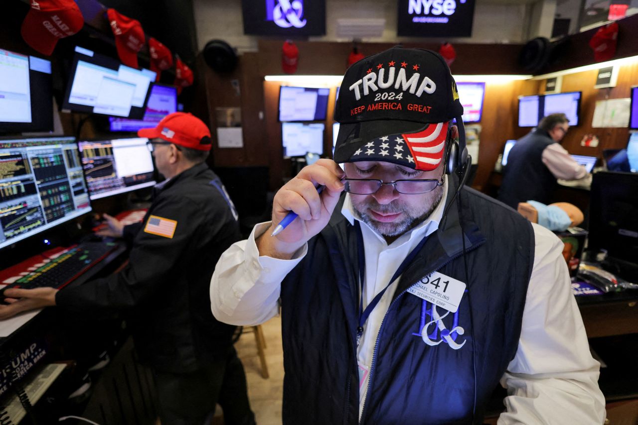 Traders wear hats in support of President-elect Donald Trump at the New York Stock Exchange on Wednesday.