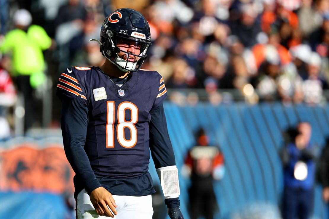 Nov 10, 2024; Chicago, Illinois, USA; Chicago Bears quarterback Caleb Williams (18) reacts after a pass against the New England Patriots during the second half at Soldier Field. Mandatory Credit: Mike Dinovo-Imagn Images