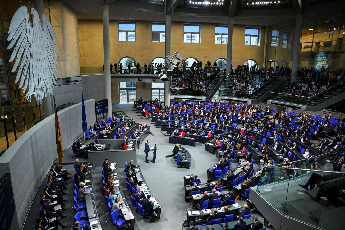 German opposition leader Friedrich Merz addresses the lower house of parliament on November 13.