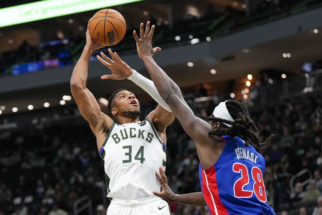 Milwaukee Bucks forward Giannis Antetokounmpo shoots over Detroit Pistons forward Isaiah Stewart during the first quarter at Fiserv Forum.