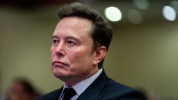 FILE PHOTO: Tesla CEO and X owner Elon Musk listens as US President-elect Donald Trump speaks during a meeting with House Republicans at the Hyatt Regency hotel in Washington, DC, U.S. on November 13, 2024.  ALLISON ROBBERT/Pool via REUTERS//File Photo