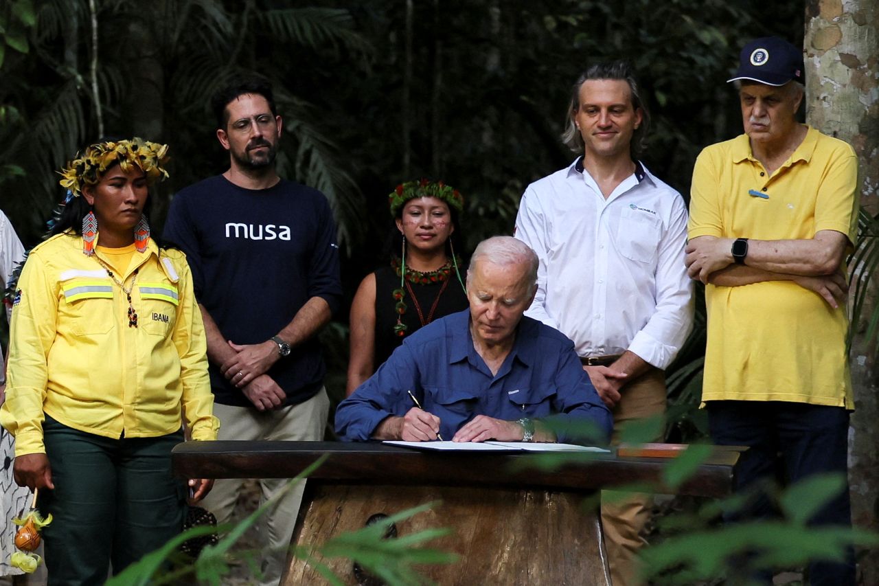 President Joe Biden signs a proclamation designating November 17 as "International Conservation Day" in Manaus, Brazil, on Sunday, November 17.