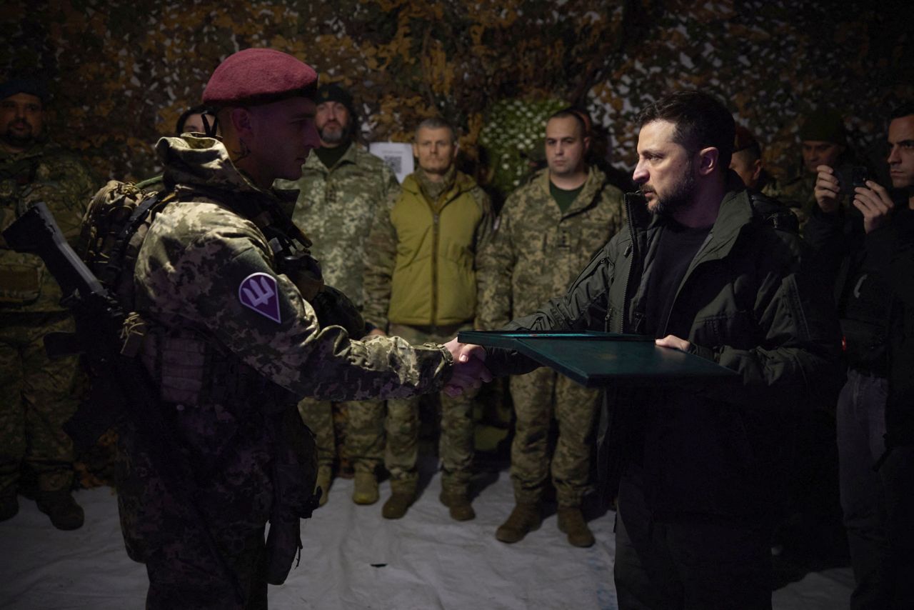 Ukraine's President Volodymyr Zelensky awards a Ukrainian service member during his visit to the town of Pokrovsk, Ukraine, on November 18.