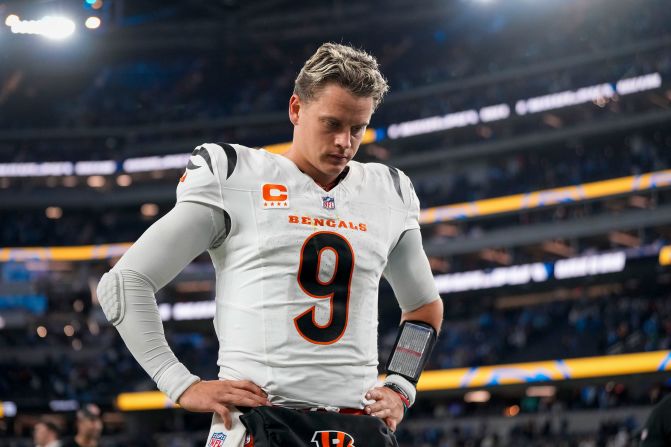 Cincinnati Bengals quarterback Joe Burrow walks off the field after his team lost to the Los Angeles Chargers 34-27 in Inglewood, California, on November 17. The Bengals are 4-7 this season with the loss.