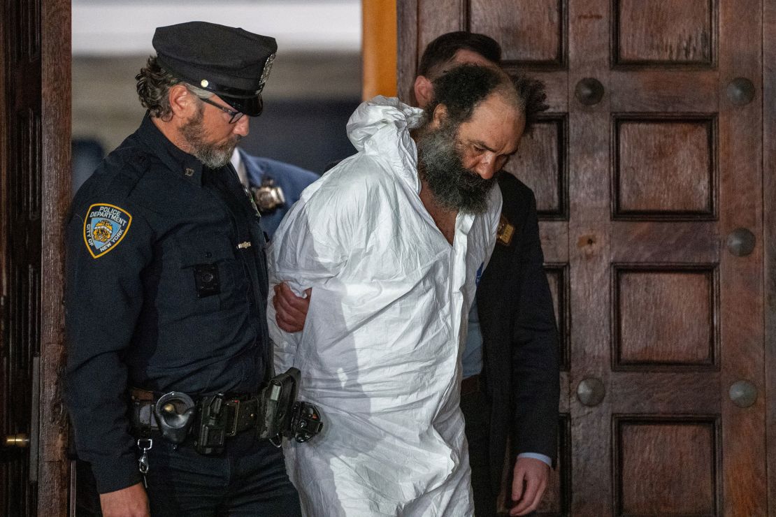 New York City stabbing spree suspect Ramon Rivera is escorted out of the 10th precinct in New York City, U.S., November 18, 2024. REUTERS/David 'Dee' Delgado
