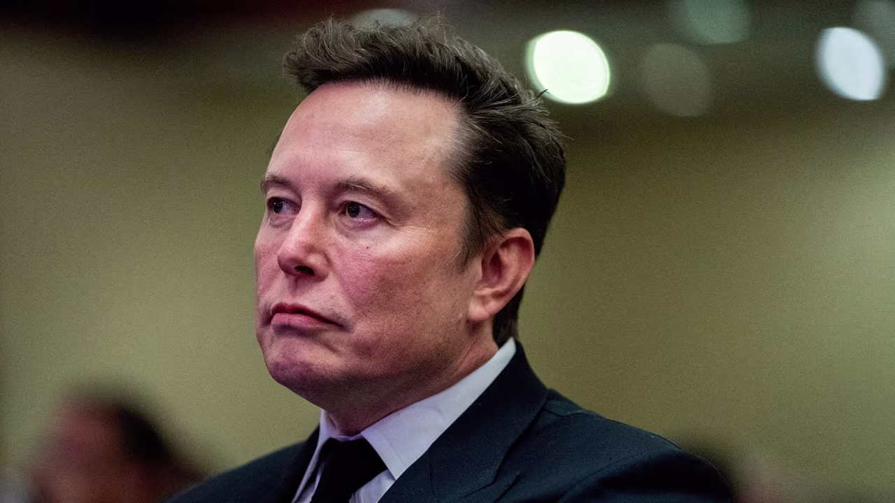 Elon Musk listens as President-elect Donald Trump speaks during a meeting with House Republicans in Washington, DC, on November 13.