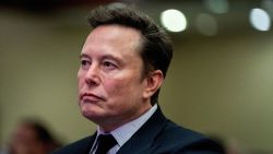 FILE PHOTO: Tesla CEO and X owner Elon Musk listens as US President-elect Donald Trump speaks during a meeting with House Republicans at the Hyatt Regency hotel in Washington, DC, U.S. on November 13, 2024.  ALLISON ROBBERT/Pool via REUTERS/File Photo