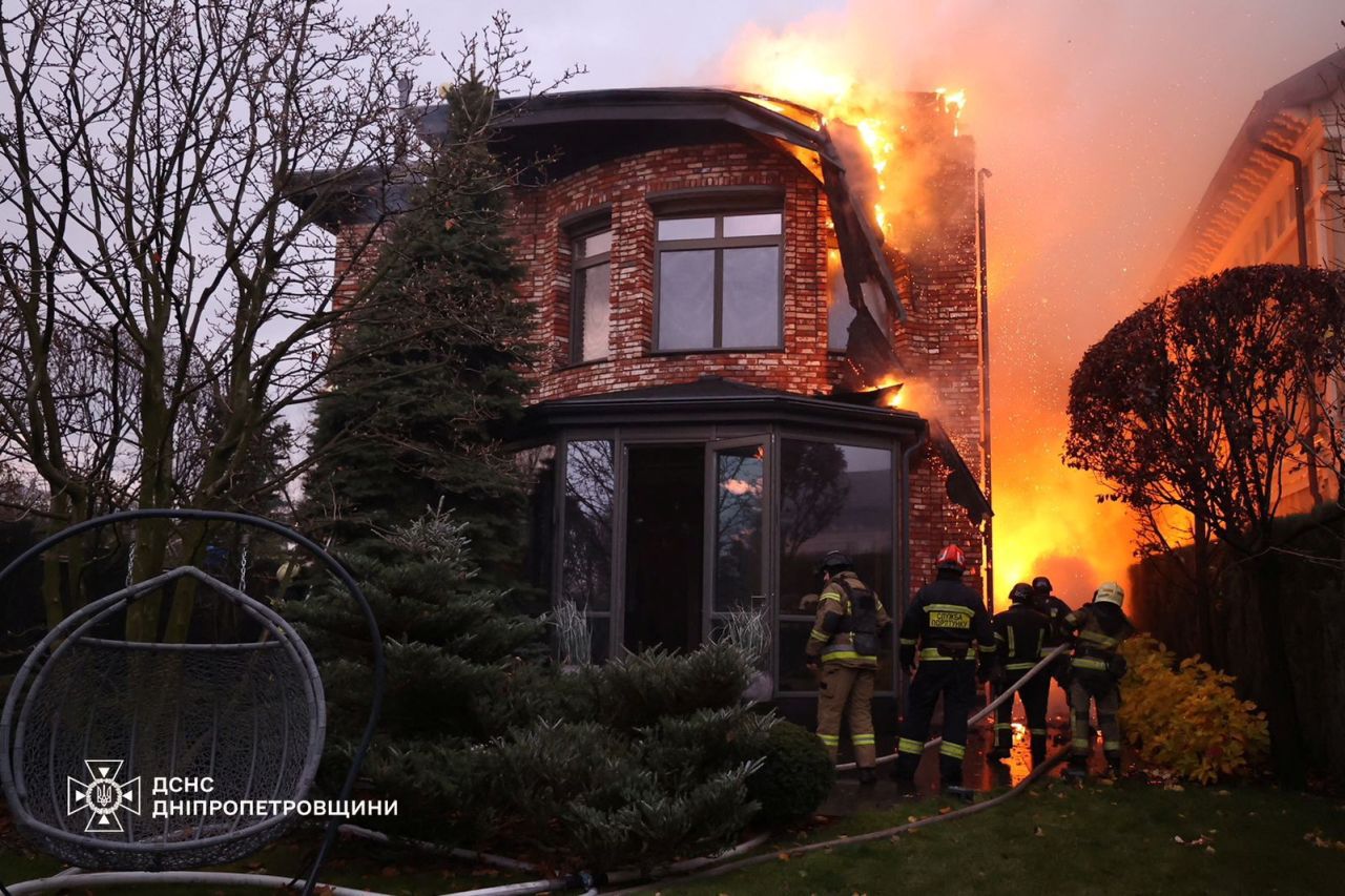 Firefighters work at the site of a Russian missile strike in Dnipro, Ukraine, on November 21.