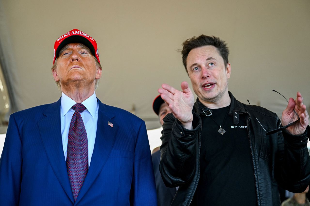 Elon Musk speaks with President-elect Donald Trump as they watch the launch of the sixth test flight of the SpaceX Starship rocket in Brownsville, Texas on November 19.