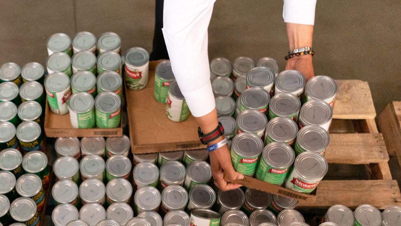 Pamela Smith, chief of the Metropolitan Police Department of the District of Columbia, assembles boxes of food for seniors ahead of the holidays at the Capital Area Food Bank in Washington, U.S., November 27, 2024. REUTERS/Nathan Howard