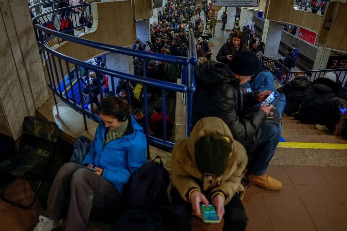 Ukrainians shelter in a metro station in Kyiv during Russia's large-scale missile attack on Thursday.