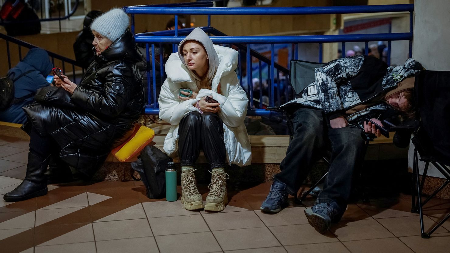 People take shelter inside a metro station in Kyiv during Russia's overnight attack.