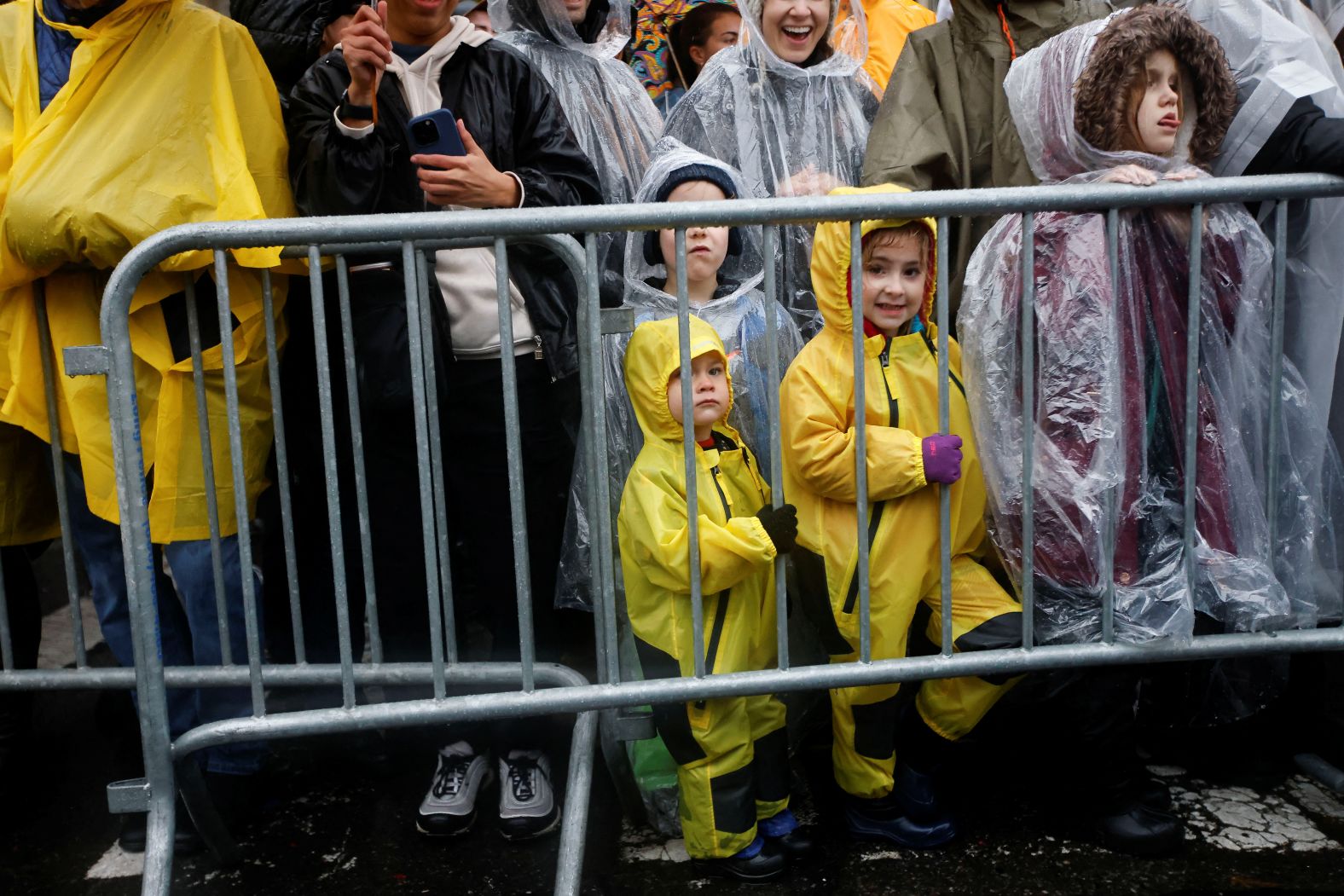 Attendees await the start of the annual Macy's Thanksgiving Day Parade in New York.