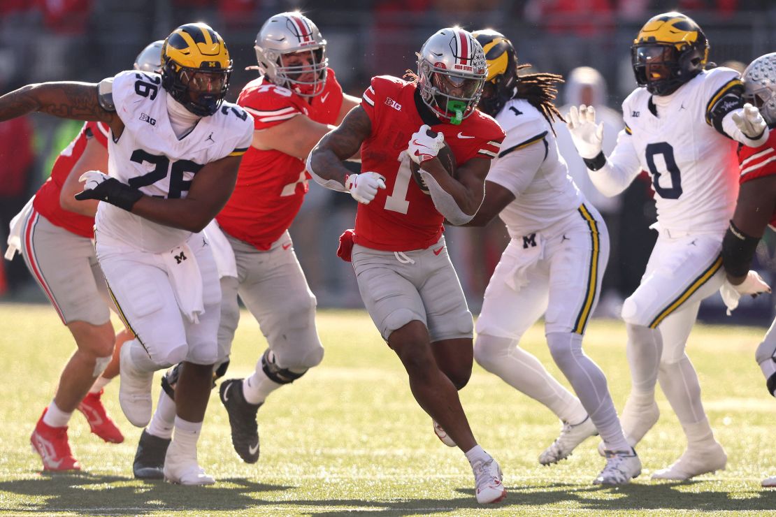 Ohio State Buckeyes running back Quinshon Judkins (No. 1) runs against the Michigan.