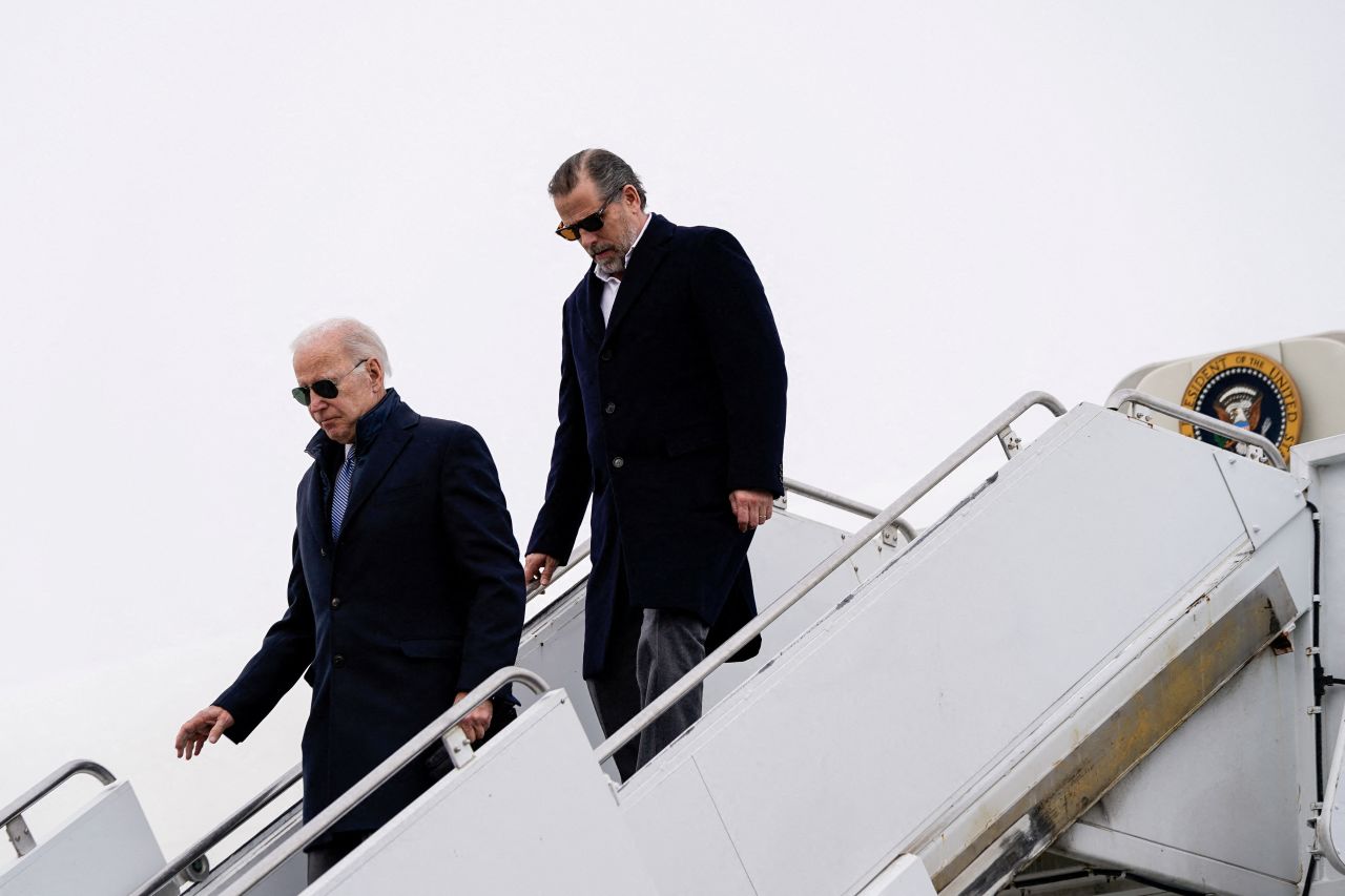 President Joe Biden and son Hunter Biden disembark from Air Force One at Hancock Field Air National Guard Base in Syracuse, New York, on February 4, 2023.